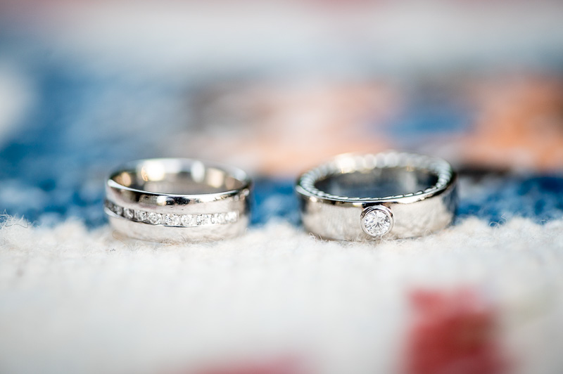 Set of wedding rings on a West Elm boho rug