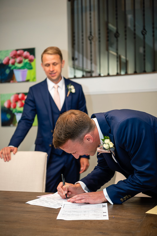 groom signing the marriage license in Charlotte North Carolina