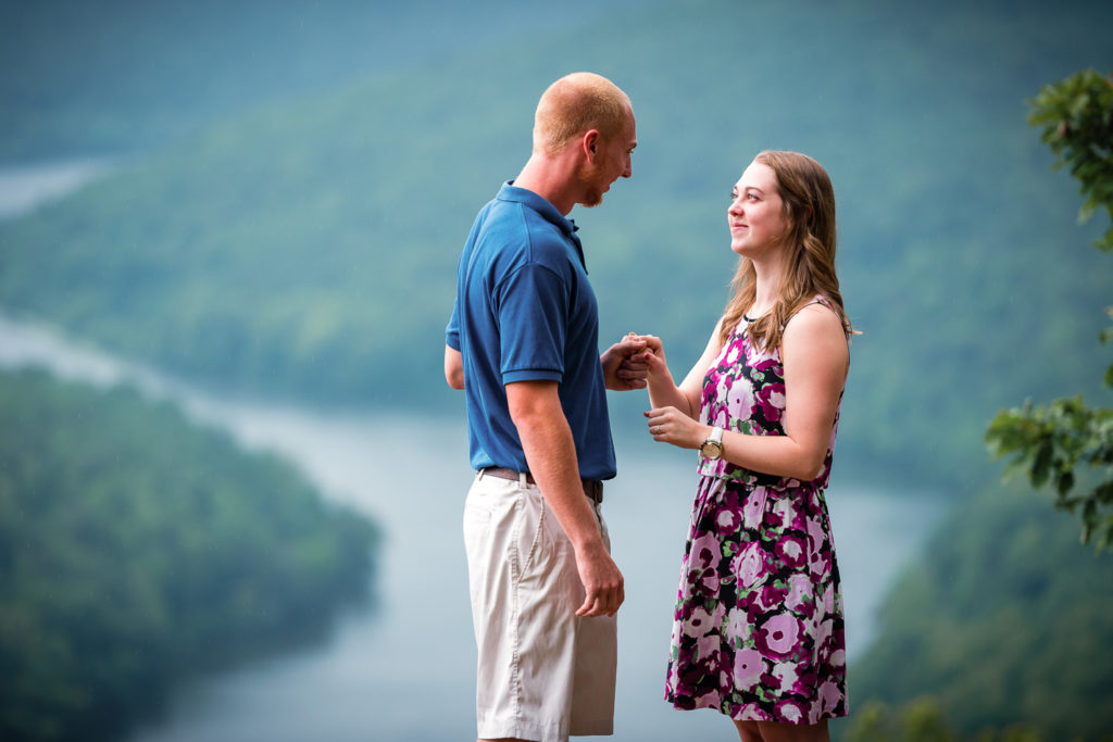 GiGirl gazing at boyfriend after he proposes to her on a mountaintop outside of Chattanooga TN