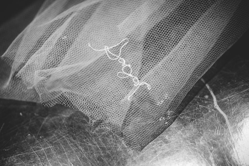 Bridal veil with groom's name sewn on it at intimate, backyard wedding in Marietta GA