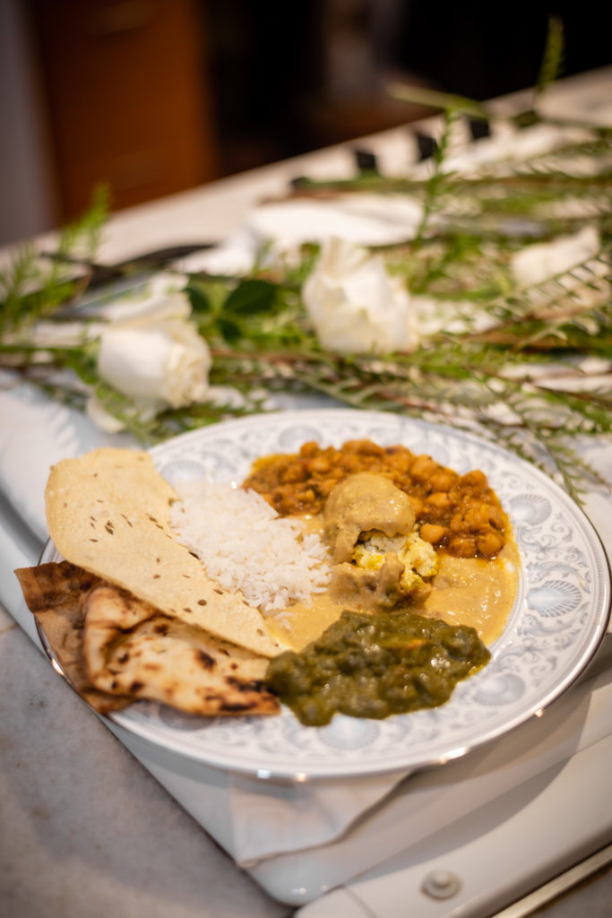 Indian food prepared on plate at intimate, backyard wedding in Marietta GA