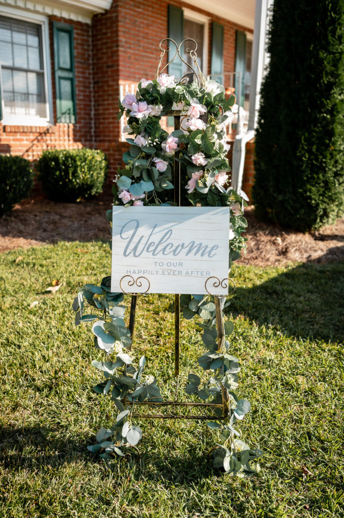 Photo of wedding welcome sign at wedding at The Gavi Estate and Barn in Forsyth GA