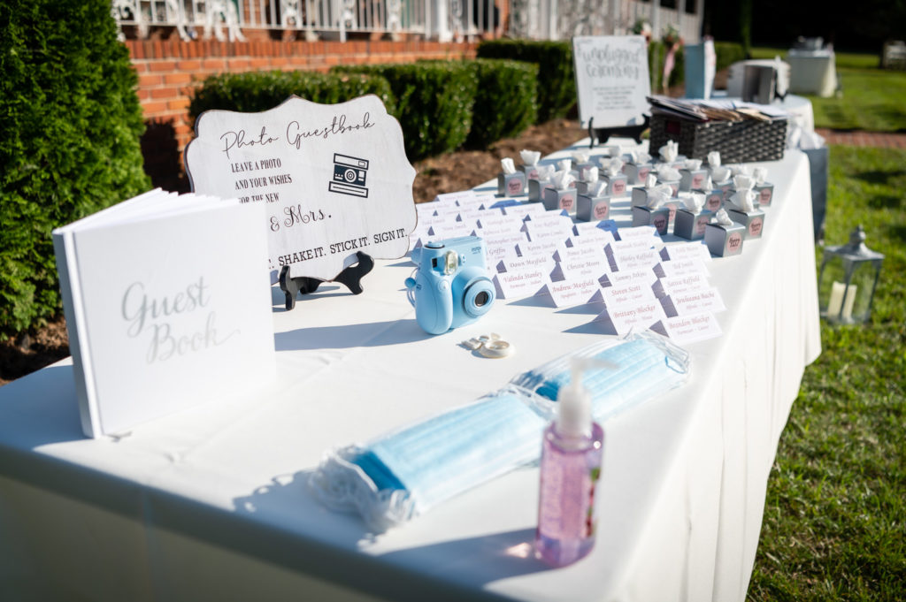 Photo of welcome table with guest book at wedding at The Gavi Estate and Barn in Forsyth GA