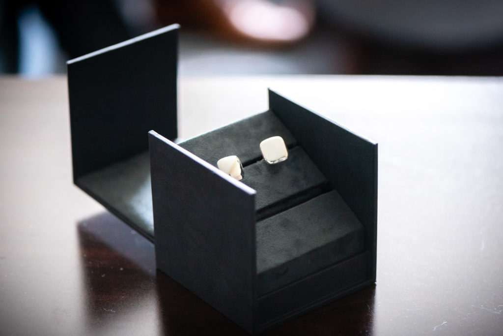 grooms cufflinks in box on the wedding day at The Hudgens Center for Art and Learning in Atlanta Georgia