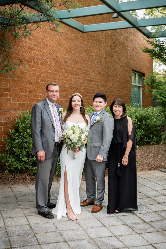 bride's immediate family portrait on the wedding day at The Hudgens Center for Art and Learning in Atlanta Georgia