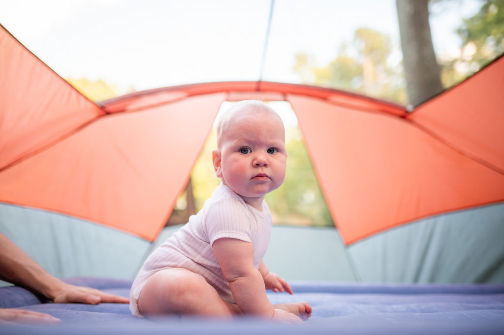 baby in camping tent